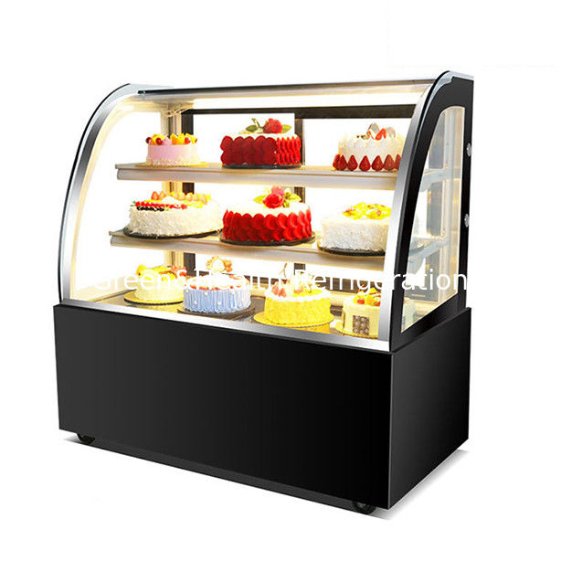 congélateur à écran de gâteau en acier inoxydable en verre incurvé avec plusieurs étagères pour un usage commercial