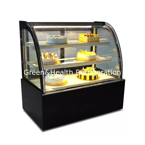 congélateur à écran de gâteau en acier inoxydable en verre incurvé avec plusieurs étagères pour un usage commercial