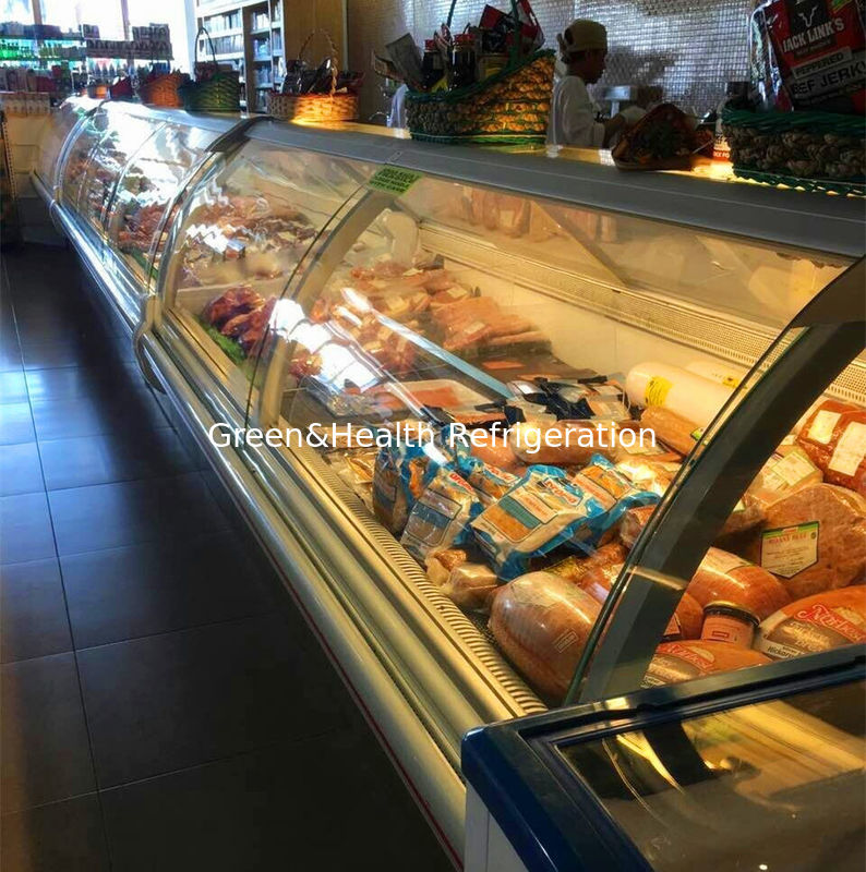Vitrine commerciale de viande avec intérieur en acier inoxydable en verre incurvé et système de refroidissement par ventilateur